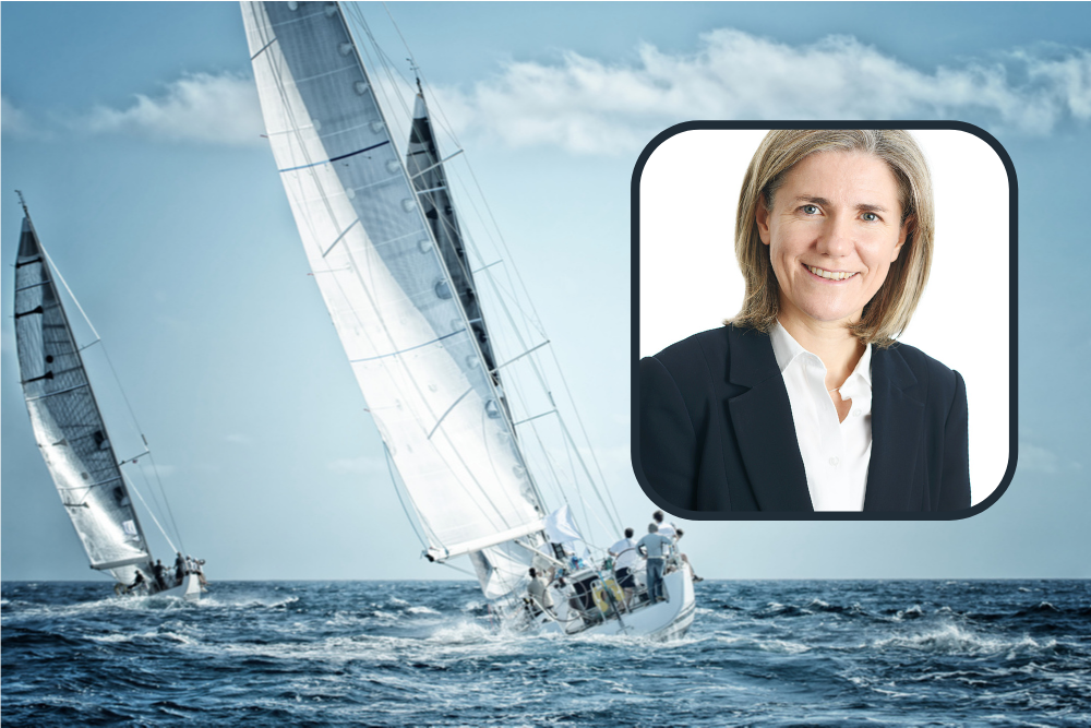 Picture of competitive sailing with woman in business suit in inset.