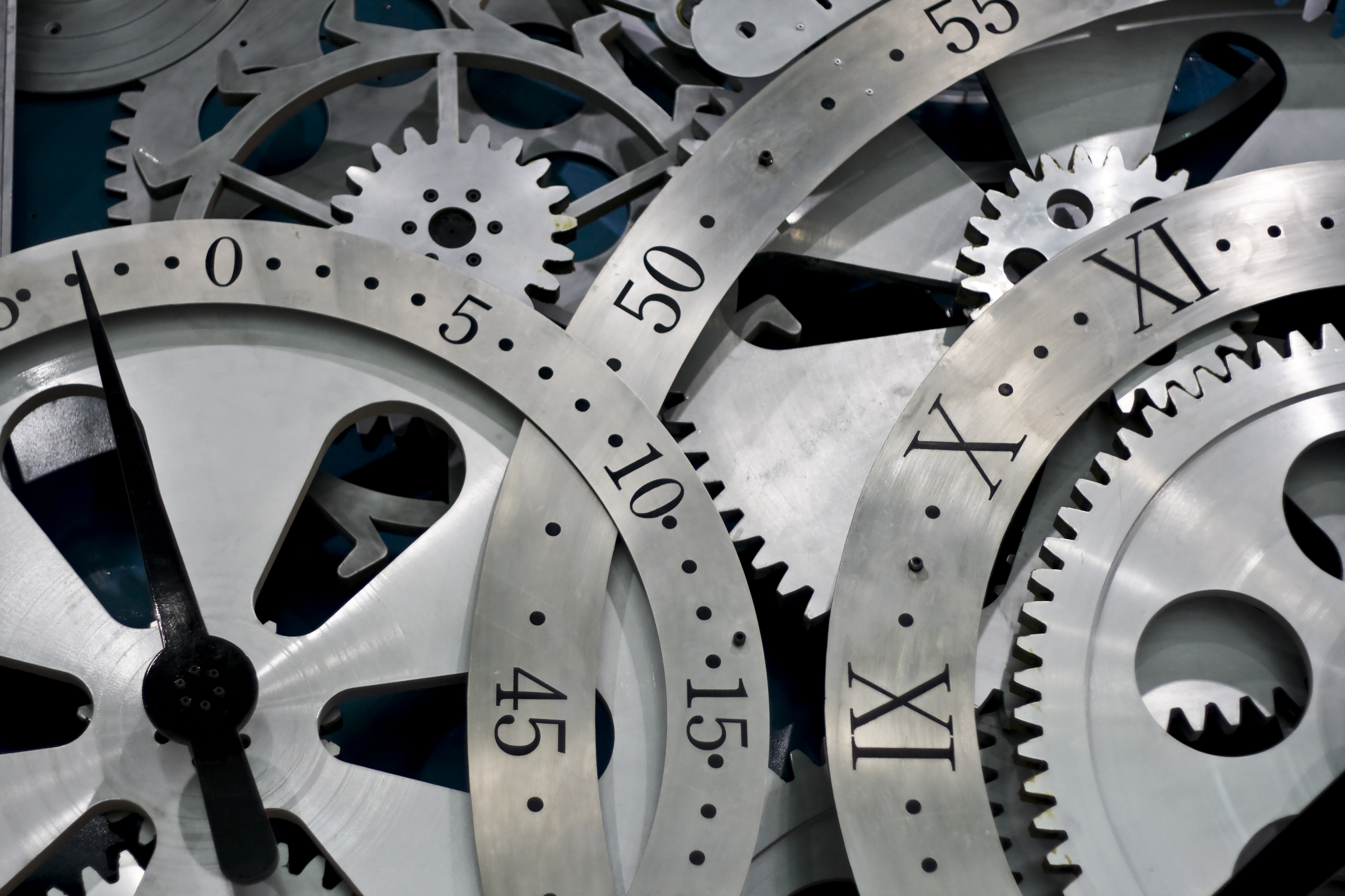 Clock and gears representing the running of a business