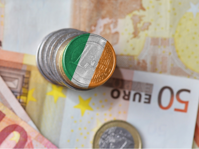 euro coin in Irish flag on euro notes.