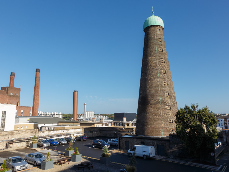 Windmill building in Dublin under a blue sky.