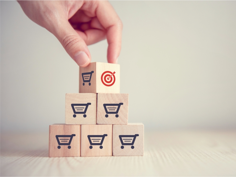 Blocks with shopping trolleys and one with a target symbol.