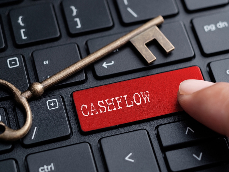 Picture of a key beside a keyboard button saying 'cashflow'