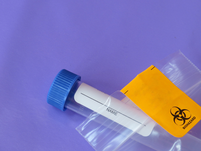 medical test kit on a purple background.