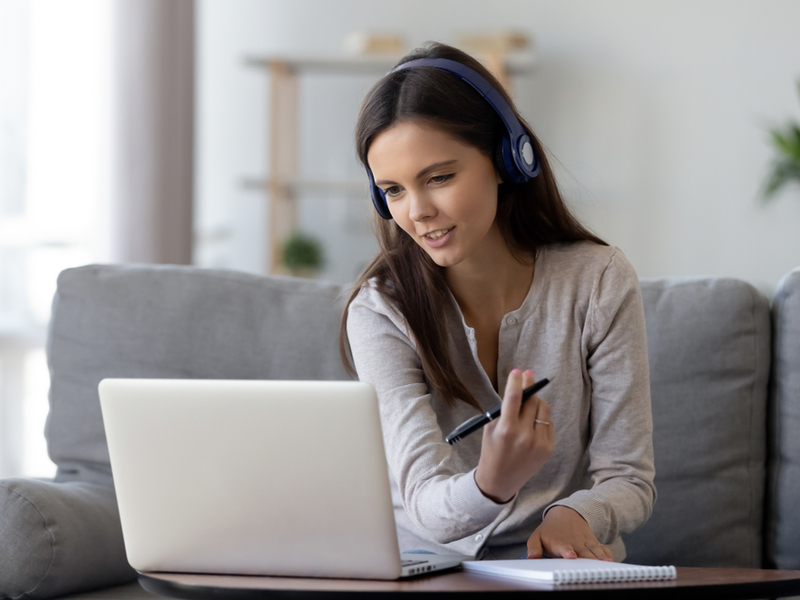 Woman doing a video conference from home.