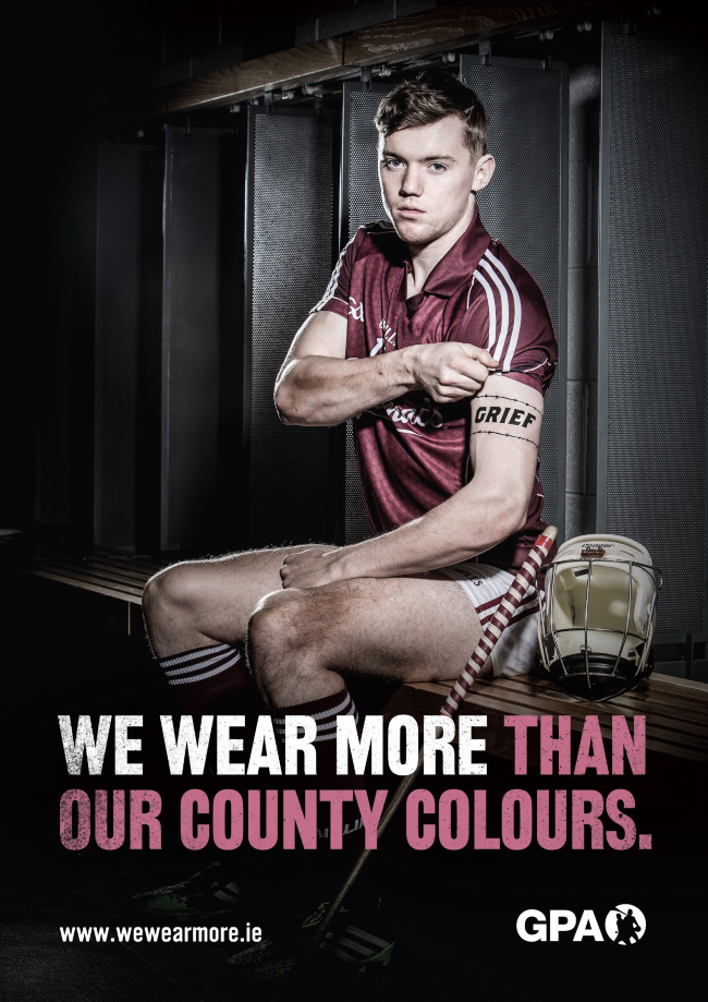 young hurling player on a bench.