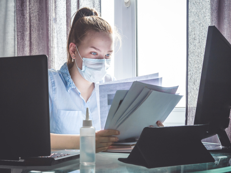 remote worker wearing a mask during Covid-19 outbreak.