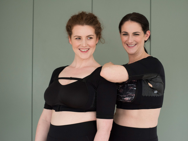 Two women wearing medtech bras to help with HS.