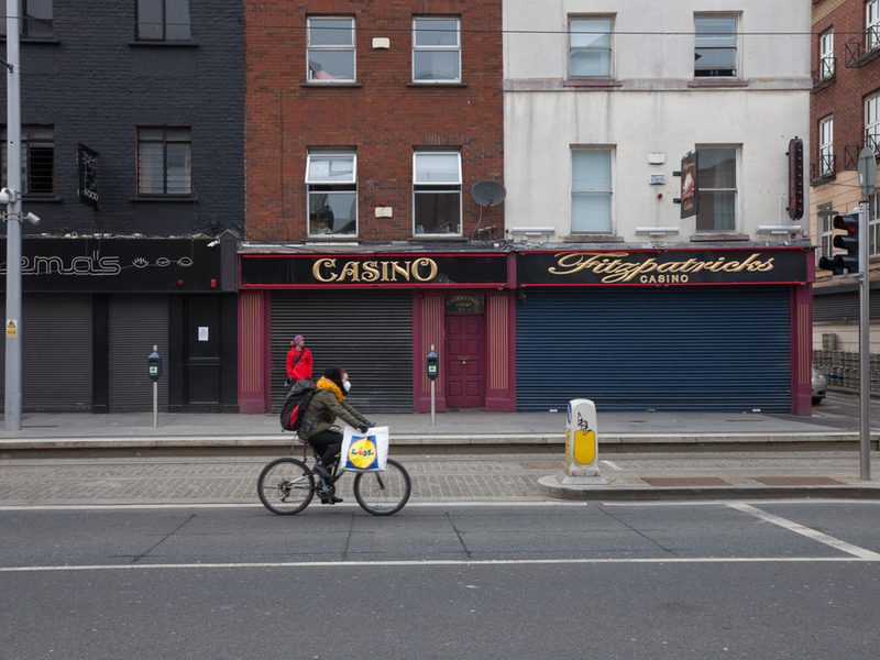 Lone cyclist cycling through Dublin during lockdown.