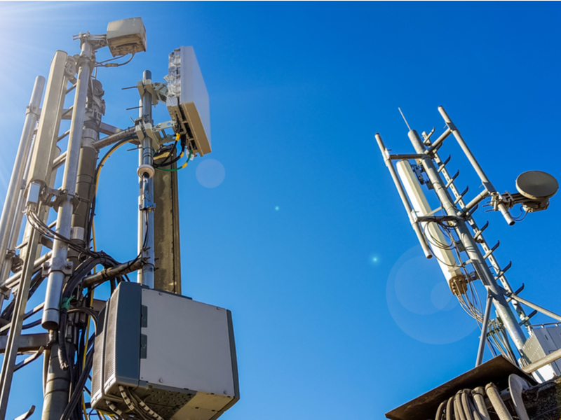 Cellular antenna in front of a blue sky.