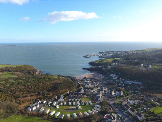 View of a town beside sea.