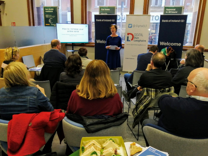 Woman speaking at an event.