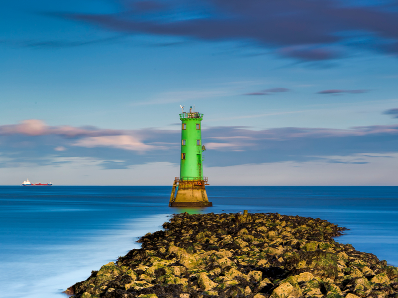 Green coloured lighthouse at Poolbeg in Dublin Bay.