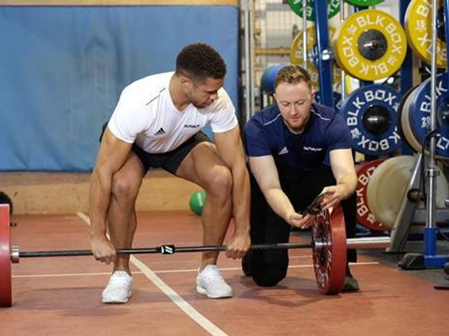 Man lifting weights.