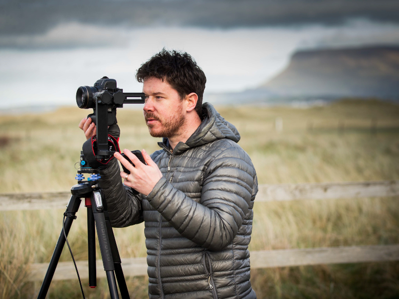 Man filming in front of Benbulben, Sligo.