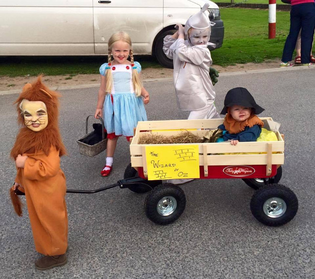 kids playing with a wagon.