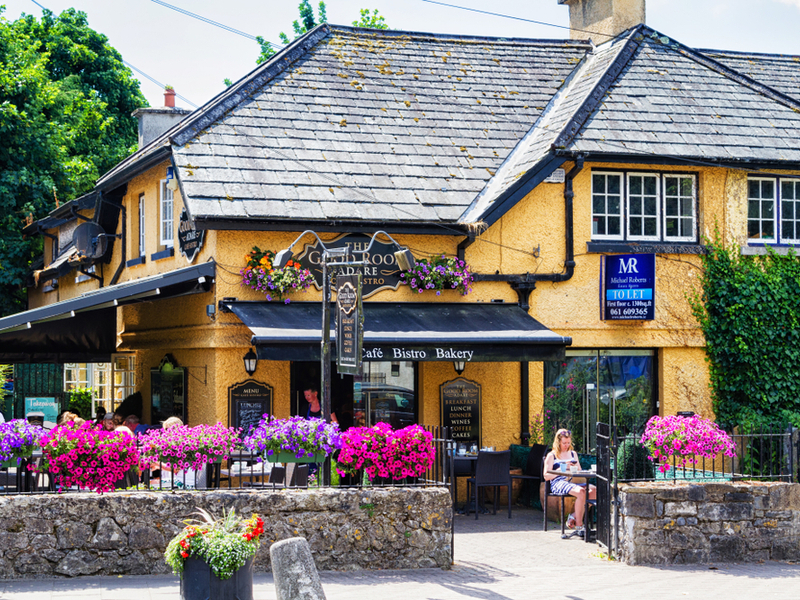 People sitting outside a restaurant in Adare.