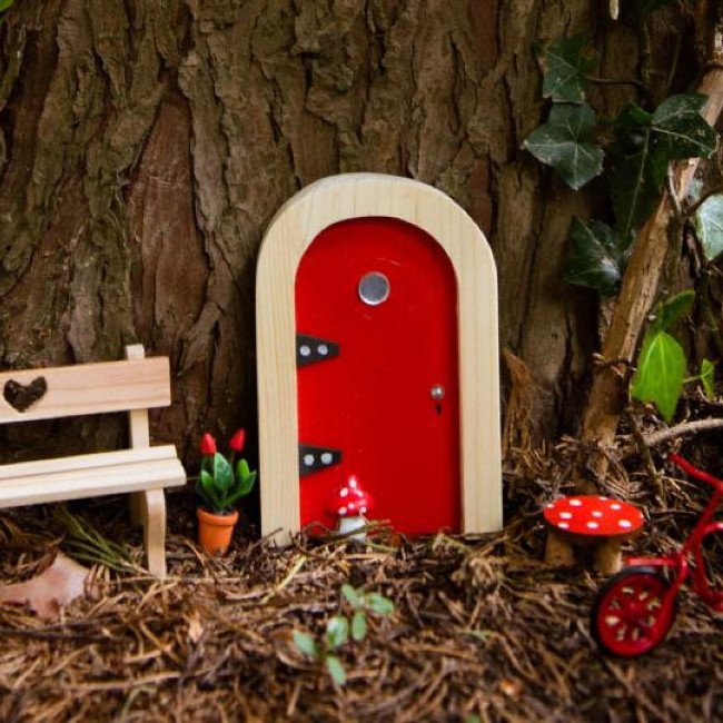 Fairy door in tree.