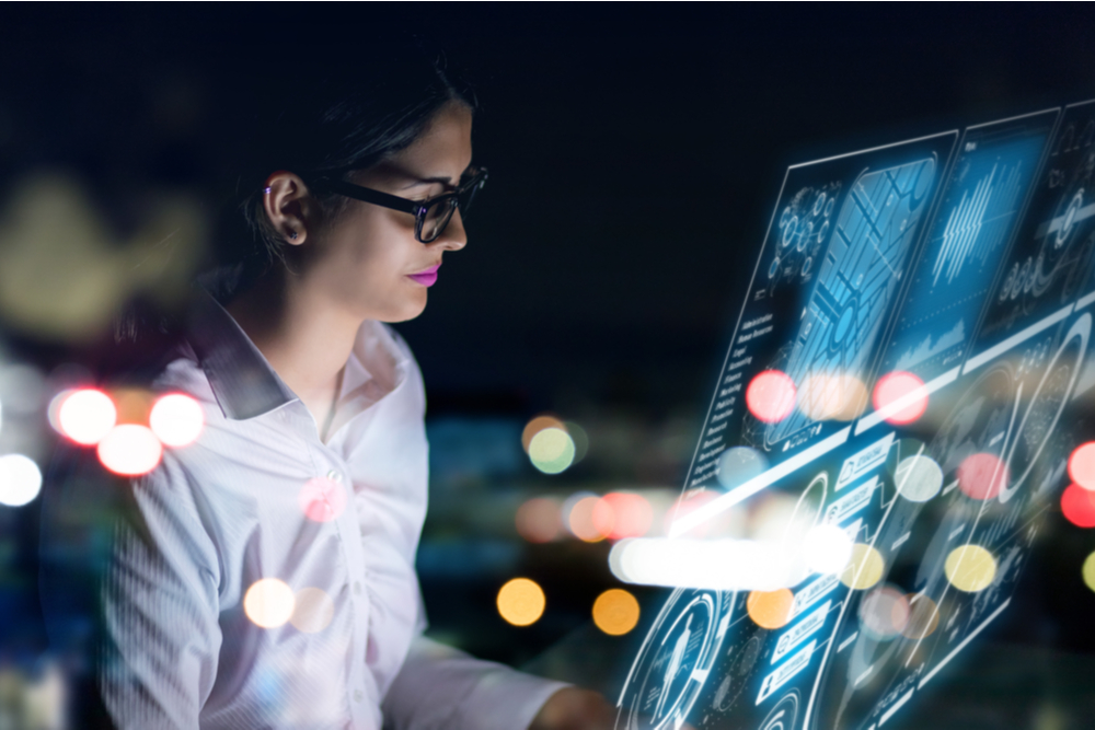 woman using a futuristic console.