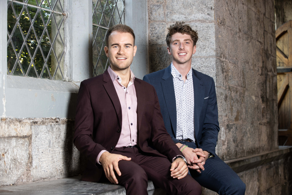 Two young men in suits.