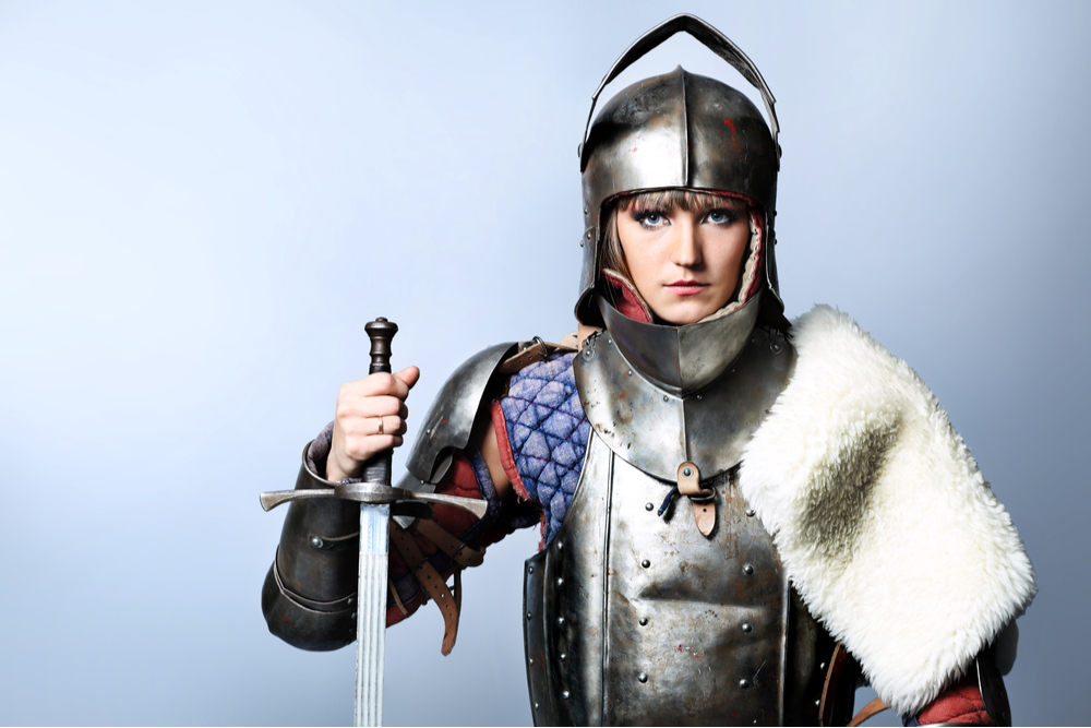 Woman in armour with a sword.