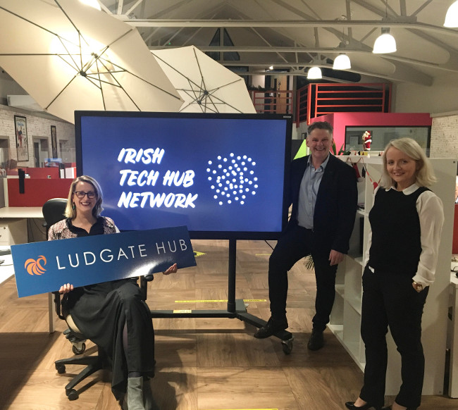 Man and two women with Irish Tech Hub Network on screen.