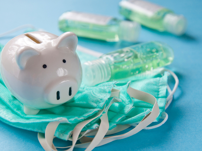 piggy bank on top of face masks.