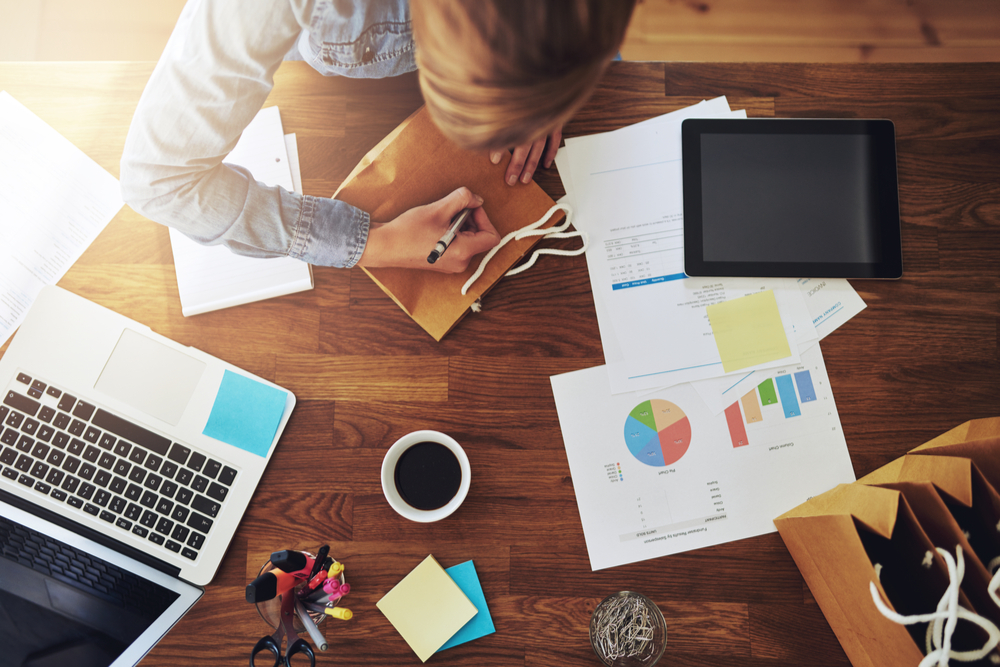 Woman entrepreneur working on a business plan.