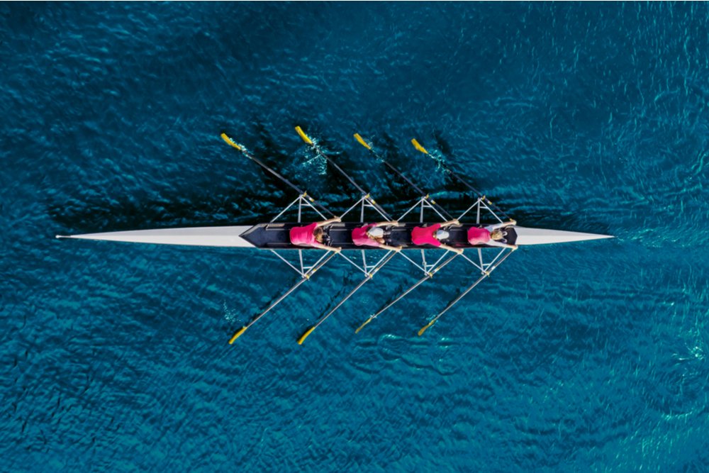 A team of women rowers.