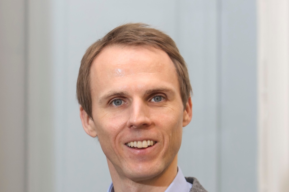 Man with light brown hair.