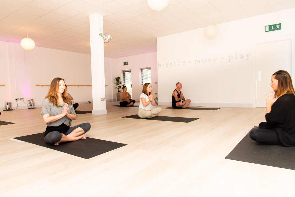 A socially distanced yoga class.