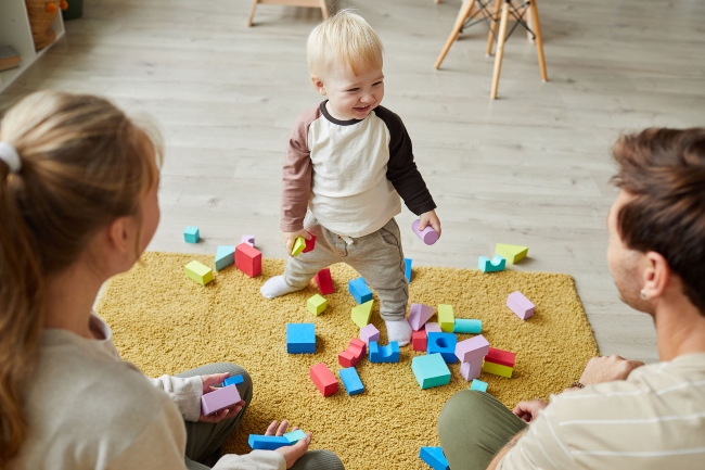 Child playing with parents.