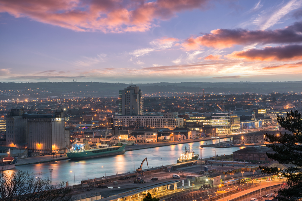 View of Cork city under colourful clouds.