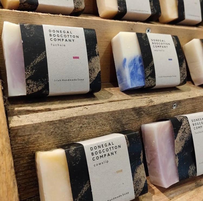 Donegal bog cotton soap on shelves.