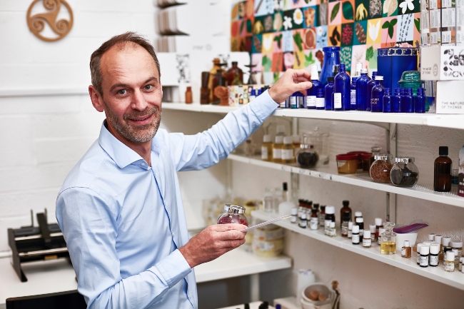 Man working in pharmacy.