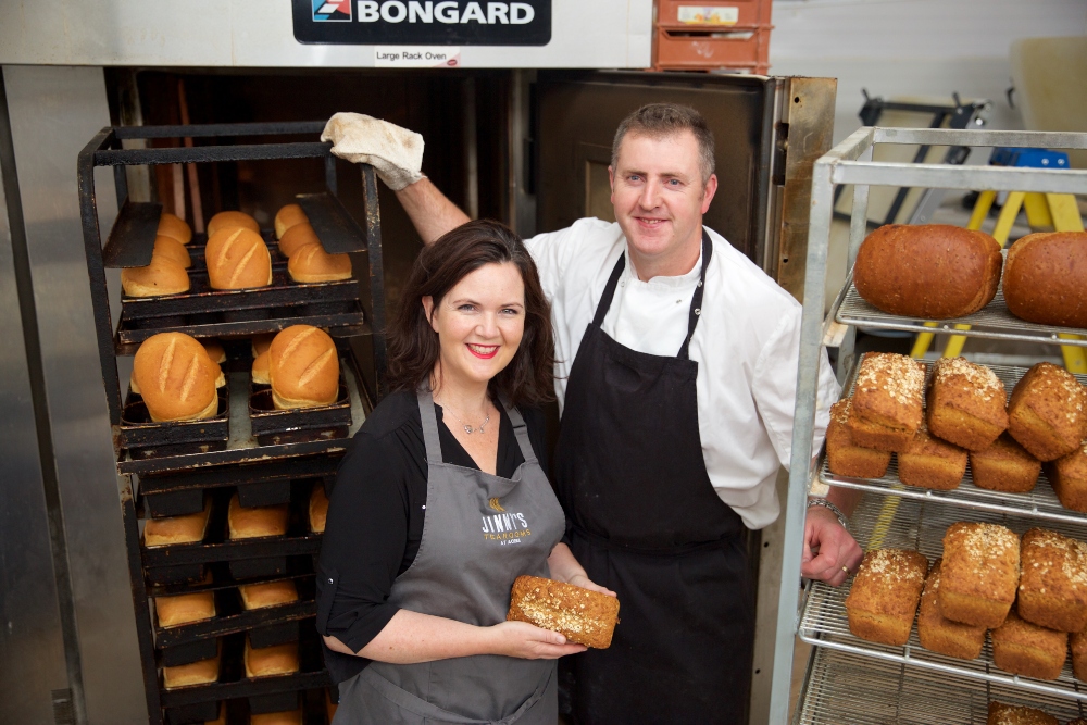 Man and woman in bakery.