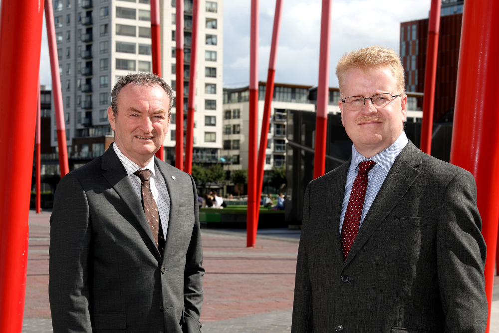 Two men in suits in Dublin.