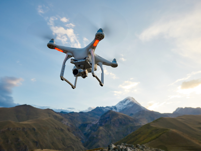 Drone flying over a mountain.