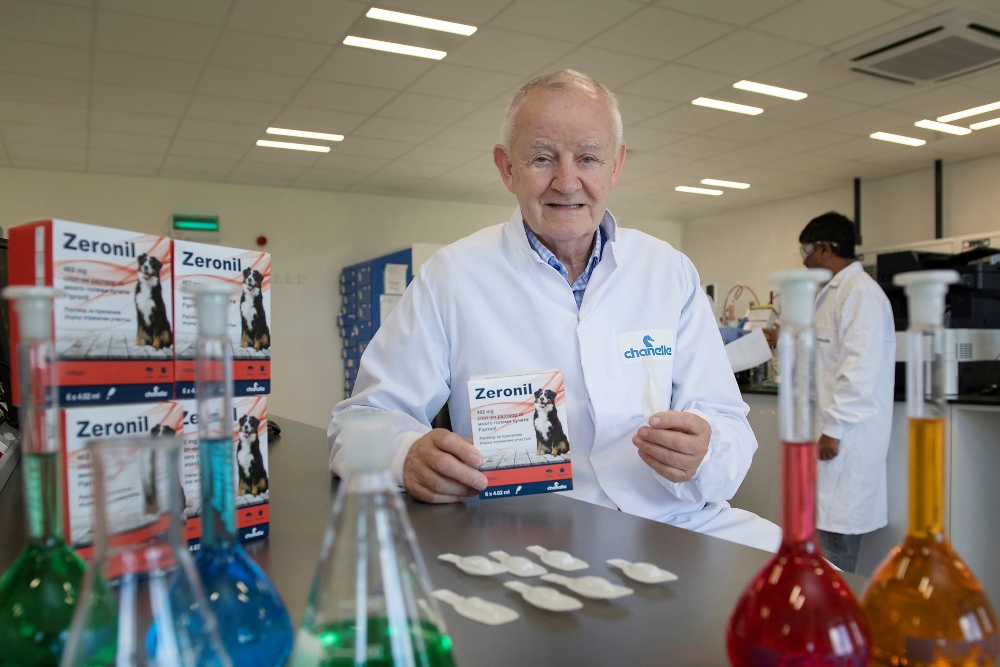 Man in white lab coat.