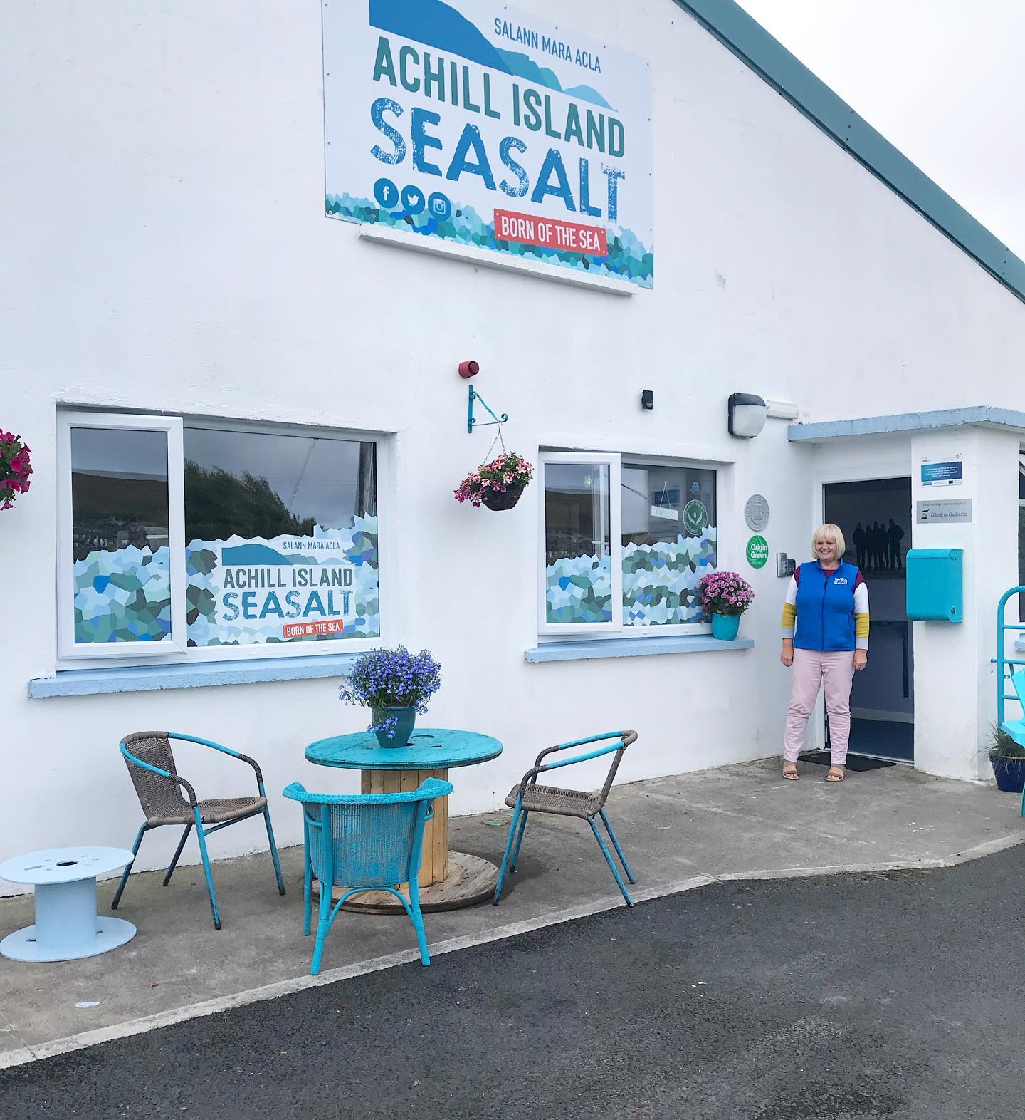 Woman standing outside Achill Island Sea Salt Co.