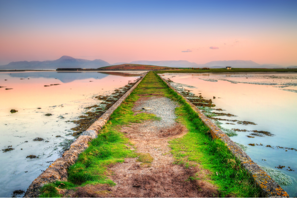 Idyllic sunset over the path in Co. Mayo, Ireland