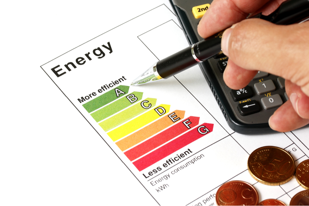 Energy efficiency concept with energy rating chart.