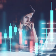 Woman investor looking at financial data.