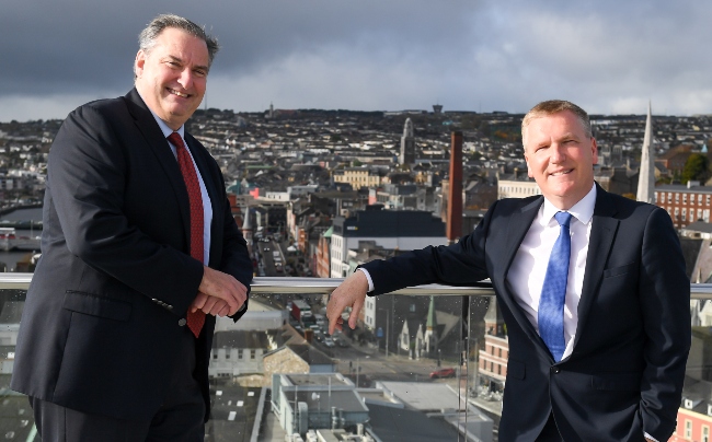 Two men on a building in Cork.