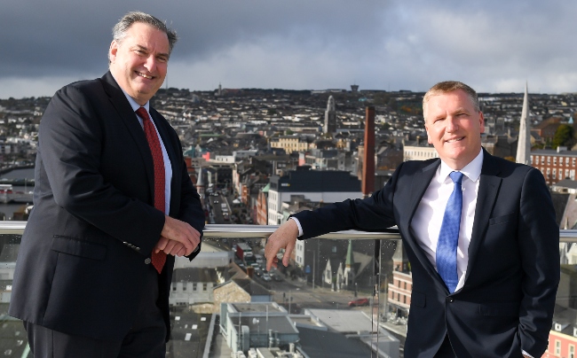 Two men on a building in Cork.