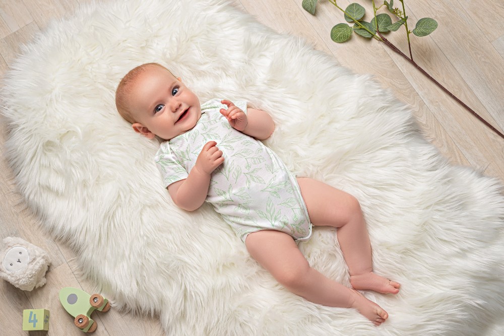 Baby wearing BambooBaby sustainable clothing.