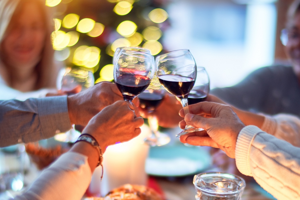 People toasting with wine.