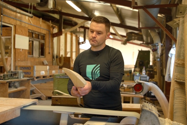 Man making hurley sticks.