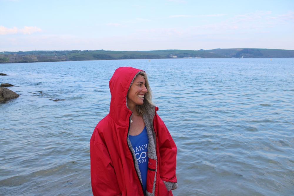 Young woman wearing Salt Robe swim robe.