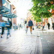 shoppers walking on a shopping high street in Ireland.