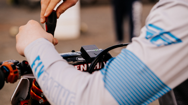 device on handlebars of a motorbike.